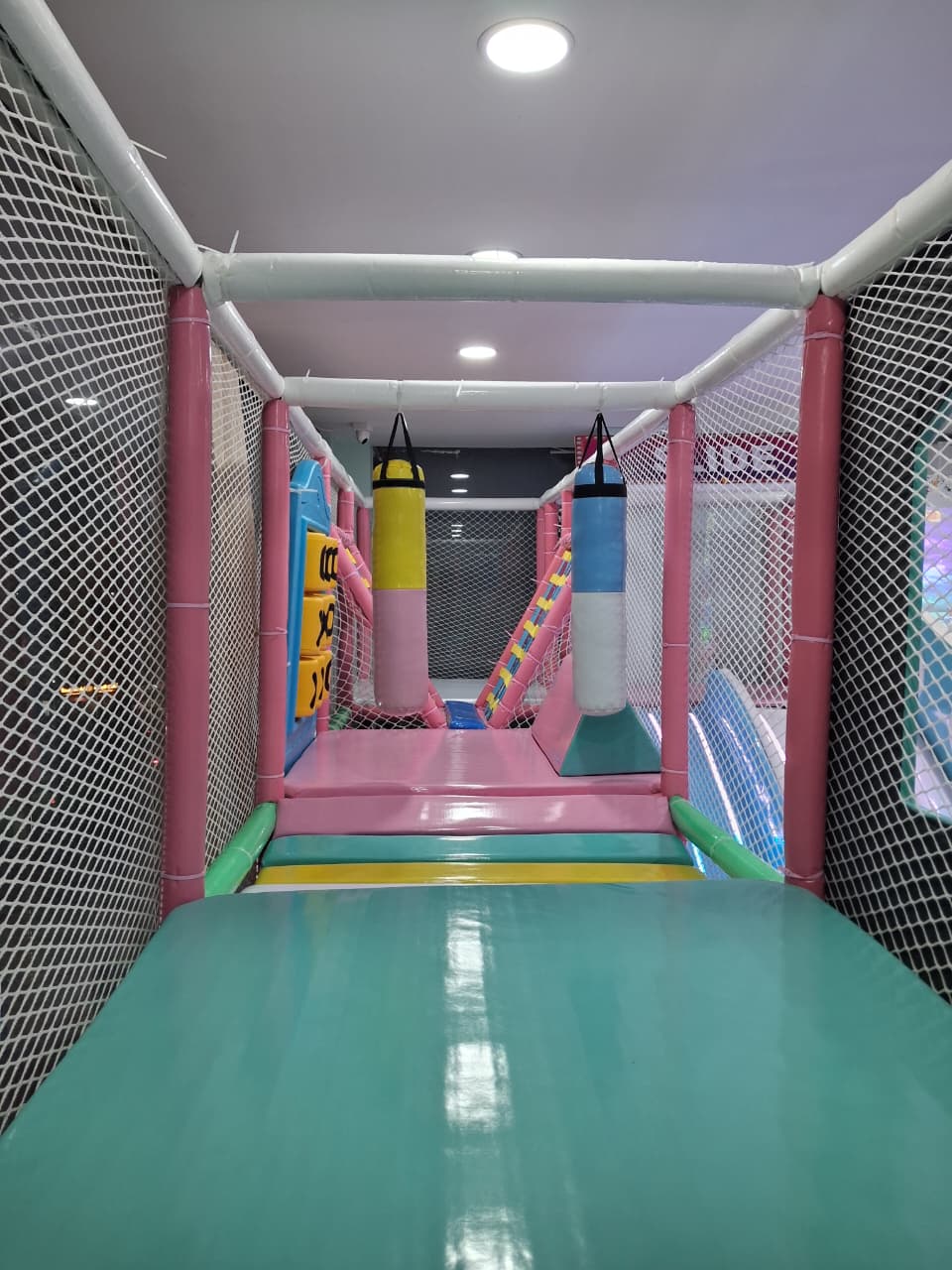 Indoor play tunnel and activity setup at Cocomelos Boduppal